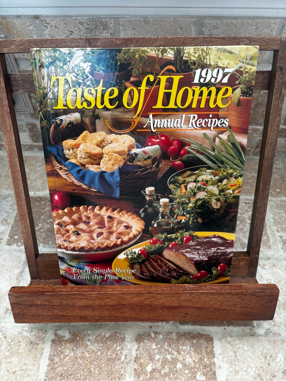 Taste of Home Cookbook with Yellow Title and Colorful Food Photography